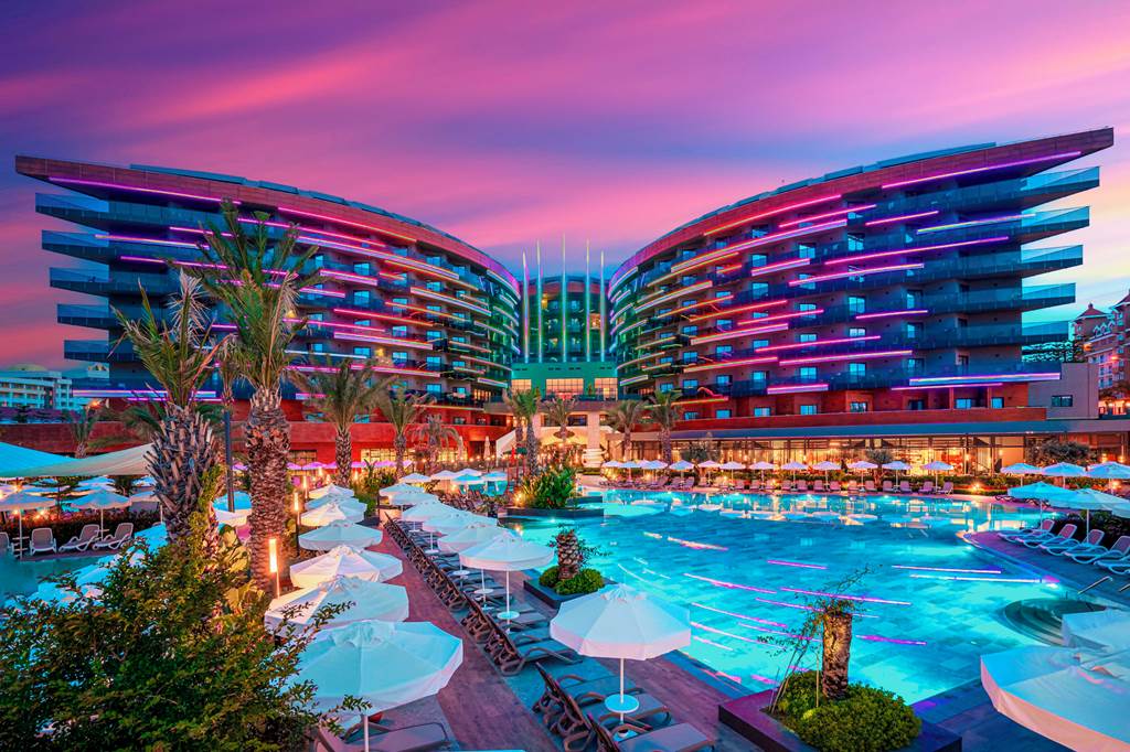 Swimming pool area at Calyptus Kirman Premium resort