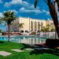 Domes Lake Algarve luxury lake resort with outdoor pool overlooking private lake and lush gardens near Falésia Beach