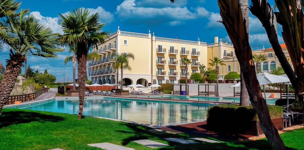 Domes Lake Algarve luxury lake resort with outdoor pool overlooking private lake and lush gardens near Falésia Beach