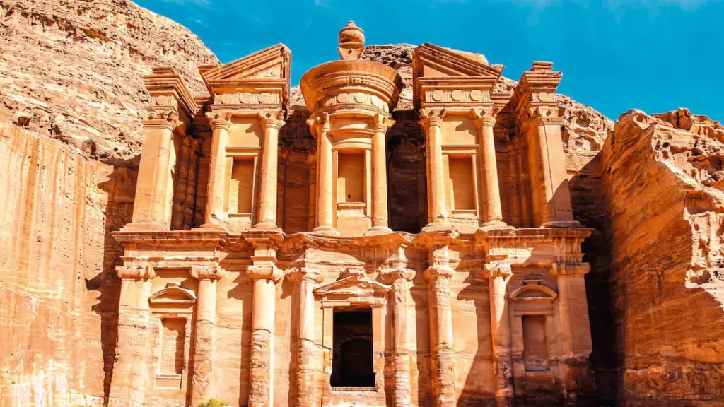 Petra’s Treasury carved into the rose-red sandstone cliffs, iconic ancient city in Jordan