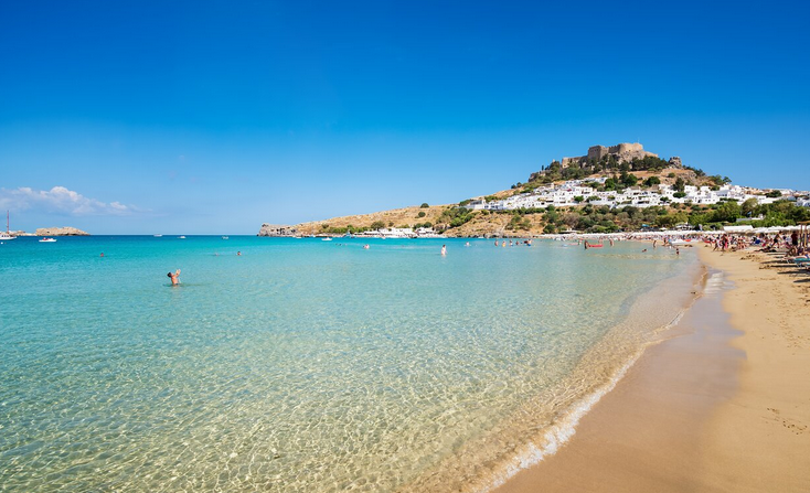 Golden sandy beach at Holiday Village Atlantica Rhodes – perfect for family holidays.